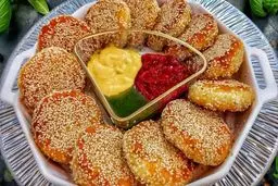 یک میان‌وعده جدید | «سیب‌زمینی کنجدی» برای سفره ایرانی +ویدئو