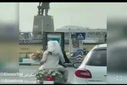 موتور عروس دیده بودید؟! | عروس و داماد سوار بر موتور گل‌زده در خیابان‌های اصفهان+ویدئو