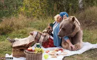 رابطه دوستانه دختر روس و خرس! + ویدئو 