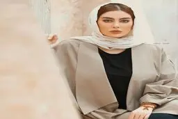 تصویری از سحر قریشی در کنار یک عکاس