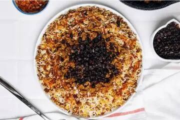 ناهار عدس پلو با کشمش و گوشت درست کن به روش سرآشپز| طرز تهیه عدس پلو مجلسی با گوشت و کشمش پلویی + نکات خاص
