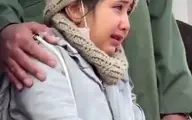  گریه‌های فرزند خردسال شهید فلاحی در فراق پدر در مراسم تشییع + ویدئو 
