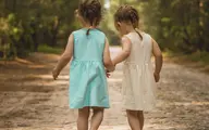 تصاویر دیوارنگاره صورتی در میدان ولیعصر به مناسبت روز دختر | نوشته شده «چشم و چراغِ خونه، دخترِ ایران» +تصویر