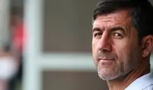 دستبند همیشگی اسطوره | وفاداری کریم باقری به پرچم ایران +ویدئو