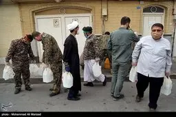 ضدعفونی خیابان‌های شهر قم توسط نیروهای حشدالشعبی