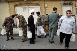 ضدعفونی خیابان‌های شهر قم توسط نیروهای حشدالشعبی