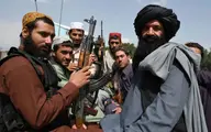  درگیر شدن طالبان با یک خبرنگار +عکس