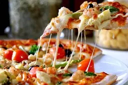 اگر این غذا رو ببینی و بپزی عاشقش میشی! | طرز تهیه‌ پیتزا رولی +ویدئو