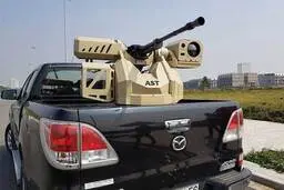 ترور شهید فخری زاده با این تیربار اتوماتیک+ عکس