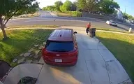 تصادف اتومبیل با زنی که رفته بود زباله ها را دم در بگذارد!+ویدئو