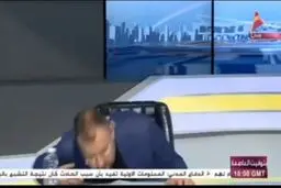 ریناس علی مجری شبکه العهد عراق در حین پخش زنده از حال رفت +‌ویدئو