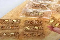 طرز تهیه کنجد بار مقوی برای عصرانه + ویدیو 