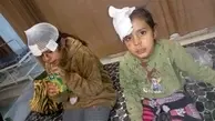 حمله وحشتناک سگ ها ی ولگرد به 2 دختر بچه در کرمانی+ عکسهای وحشتناک