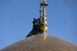پرچم گنبد حرم رضوی به رنگ سیاه درآمد + تصویر 
