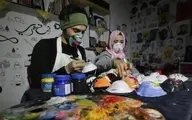  جوانان هنرمند فلسطینی مردم غزه را برای استفاده از ماسک تشویق می کنند