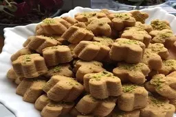  شیرینی نخودچی عیدو خودت درست کن | طرز تهیه شیرینی نخودچی به روش قنادی ها 
