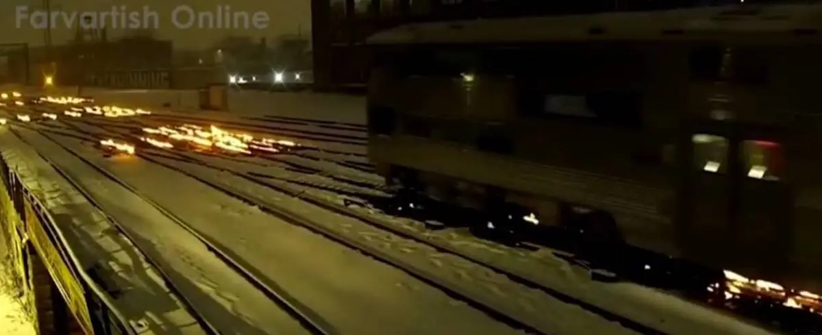 آتش زدن سوئیچ های مسیر راه آهن شیکاگو برای پیش گیری از یخ زدگی + ویدئو 