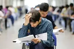 مجازات سنگین برای تخلف امتحانی | همراه داشتن موبایل در آزمون‌ ملی و ۱۰ سال محرومیت!