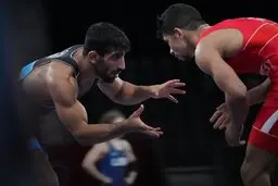 کشتی آزاد المپیک ۲۰۲۰؛ پیروزی قیاسی مقابل کشتی گیر تونسی در دور نخست