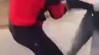 حمله یک مرد به زن محجبه و کتک زدن او+ویدئو