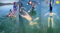  شناگر ماجراجو زیر یخ تا پای مرگ پیش رفت!+ویدئو
