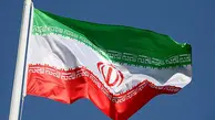 برافراشته شدن پرچم ایران در خیابان تهران شهر سئول + عکس