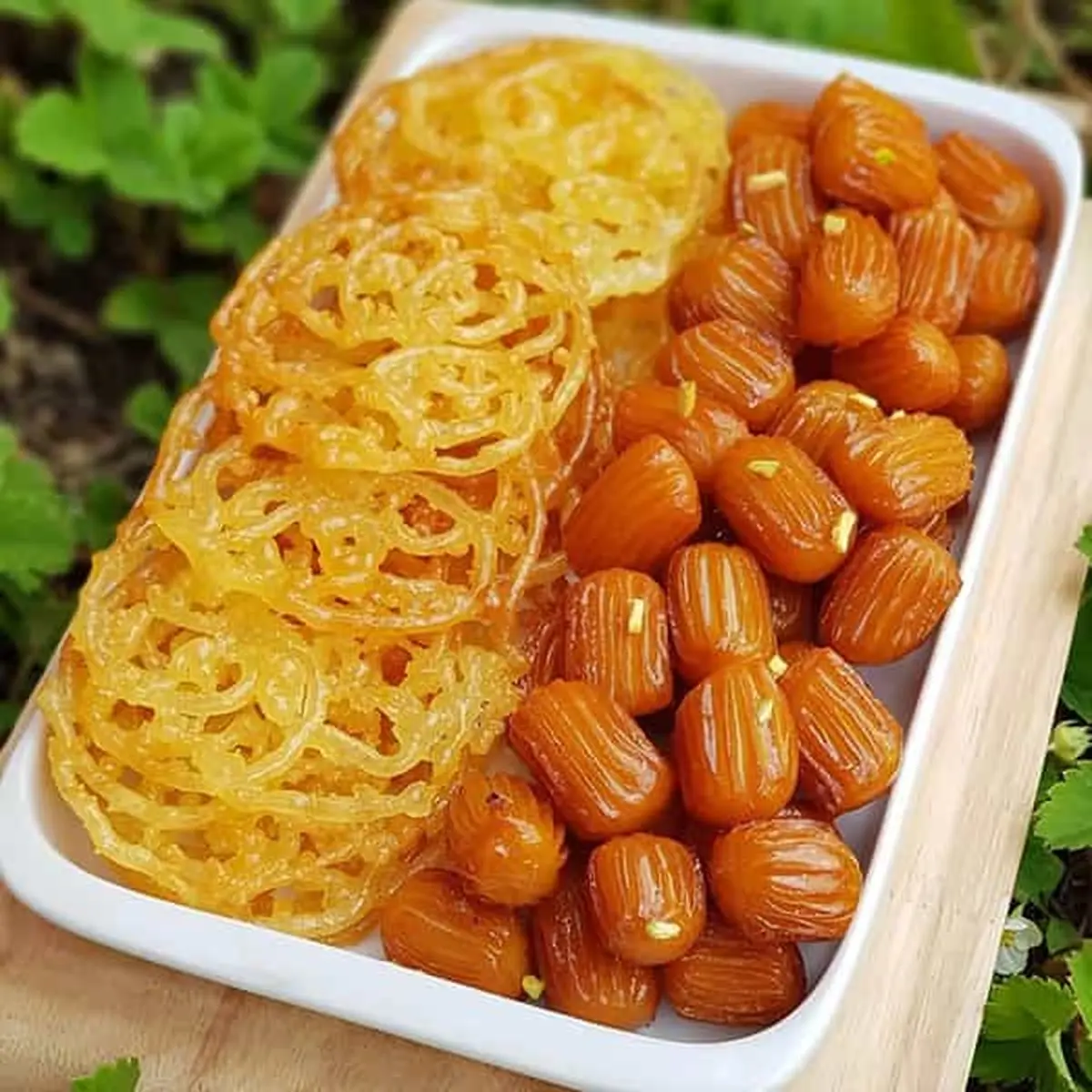 چطور در خانه اندازه نیم کیلو زولبیا بپزید؟+ویدئو 