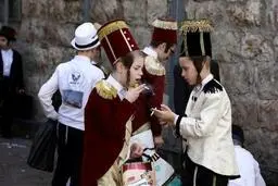 از جشن "پوریم" تا مراسم انتقال مشعل المپیک از یونان + تصاویر 