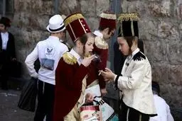  از جشن "پوریم" تا مراسم انتقال مشعل المپیک از یونان + تصاویر 