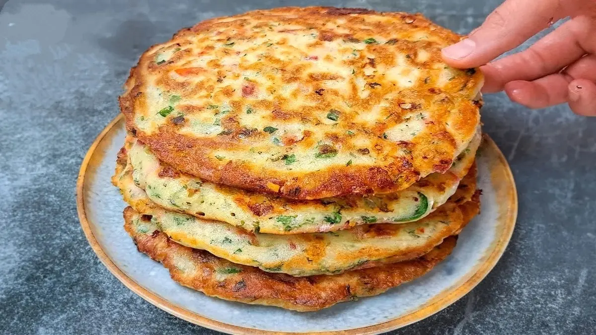 طرز تهیه نان پیتزایی | بچه ها عاشق این نون پیتزایی می‌شن! +ویدئو