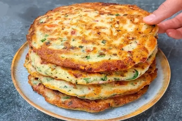 طرز تهیه نان پیتزایی | بچه ها عاشق این نون پیتزایی می‌شن! +ویدئو
