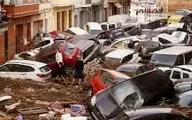 هشدار در اسپانیا | مردی با فداکاری جان زن گرفتار در سیل را نجات داد!