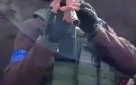 فلوت‌نوازی سرباز اوکراینی در میدان جنگ+ویدئو
