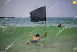  اعتراض یک اسرائیلی در ساحل تل‌آویو+ عکس