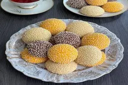 دنبال یک میان وعده خوشمزه و ساده هستید؟ | طرز تهیه کلوچه کنجدی بدون فر و همزن