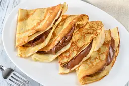 یک صبحانه خوشمزه و مقوی | دستور‌‌پخت کرپ نوتلا همراه موز و توت فرنگی