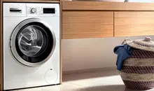 چرا ماشین لباسشویی بوی بد می‌دهد؟ | ۵ دلیل رایج و راهکار ساده برای رفع آن