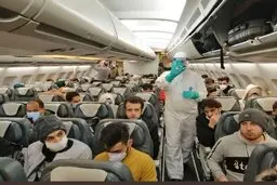 ببینید | تصویری از دانشجویان ایرانی مقیم ووهان که به تهران برگشتند در داخل هواپیما