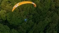 اقدام نمادین برای نجات جنگل‌ها | رهاسازی بذر بلوط از آسمان شمال توسط پاراگلایدر +ویدئو