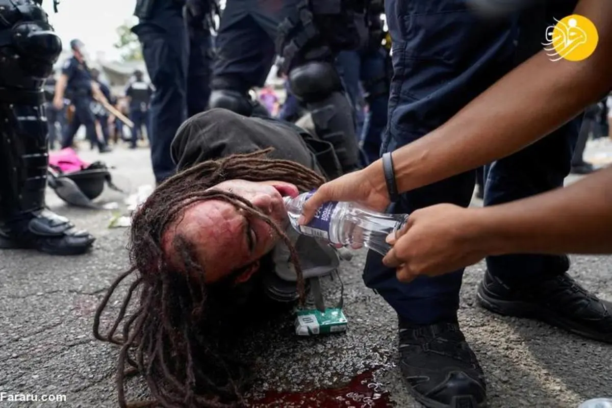 تظاهرات  |   پلیس معترضان را به اجتماع غیرقانونی  متهم می کند.+(تصاویر)