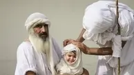 غسل تعمید کودکان مندایی در اهواز+ تصویر