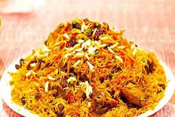 طرز تهیه کشمش‌پلو مجلسی غذای قدیمی ایرانی+ویدئو
