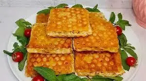 راه حل مشکل ناهارهای عجله‌ای | لقمه پیتزایی با نان لواش، دستوری سه‌سوته برای روزهای شلوغ +ویدئو