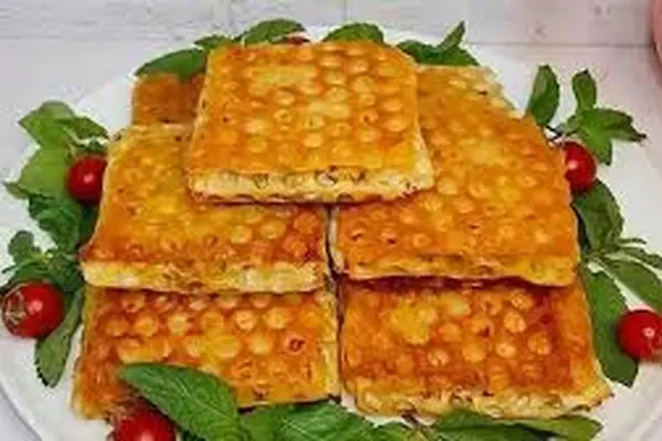 راه حل مشکل ناهارهای عجله‌ای | لقمه پیتزایی با نان لواش، دستوری سه‌سوته برای روزهای شلوغ +ویدئو