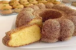 اگر از کیک‌های شکلاتی و خامه‌ دار خسته شدی، با این روش یه کیک مقوی و متفاوت درست کن! | طرز تهیه کیک کنجدی مجلسی در نیم ساعت! + ویدئو