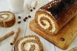 تیرامیسو به شکل رول، دسری شیک و خوشمزه برای مهمانی‌های تابستانی! | طرز تهیه رول ترامیسو +ویدیو
